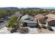 Aerial view of a cozy home, with a two-car garage, desert landscaping, and tile roof at 28604 N 21St Ln, Phoenix, AZ 85085