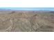 Striking aerial capture shows the region's rough terrain that offers nature trails and desert landscape at 28604 N 21St Ln, Phoenix, AZ 85085