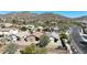 Aerial view of a backyard in community nestled in the mountains at 28604 N 21St Ln, Phoenix, AZ 85085