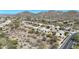 Scenic aerial view of a community nestled in the mountains at 28604 N 21St Ln, Phoenix, AZ 85085