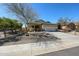 Charming single-story home with a two car garage, xeriscape landscaping, and neutral color palette at 28604 N 21St Ln, Phoenix, AZ 85085