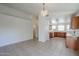 Spacious eat-in kitchen features tile flooring and ample natural light at 28604 N 21St Ln, Phoenix, AZ 85085