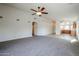 Bright, open-concept living room flows into kitchen at 28604 N 21St Ln, Phoenix, AZ 85085