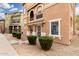 A beautifully maintained home with a front yard complemented by lush, green bushes at 34924 N 30Th Ave, Phoenix, AZ 85086