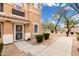 Inviting home entrance with a decorative security door and neatly manicured front yard at 34924 N 30Th Ave, Phoenix, AZ 85086