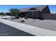 Charming single-story home featuring low-maintenance landscaping and a neutral color palette at 3829 N Princeton Ln, Casa Grande, AZ 85122