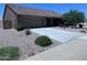 Charming single-story home with a two-car garage and desert-friendly landscaping at 3829 N Princeton Ln, Casa Grande, AZ 85122