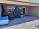 Covered patio with pavers, offering an outdoor living space with room for seating and grilling at 3829 N Princeton Ln, Casa Grande, AZ 85122