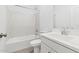 Clean, bright bathroom featuring a shower-tub combo with modern finishes at 3889 S 233Rd Ln, Buckeye, AZ 85326