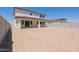 Expansive backyard offers ample space for outdoor living and entertaining with a covered patio at 40113 N Alameda Dr, San Tan Valley, AZ 85140