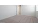 Neutral carpeted bedroom with white walls and baseboards at 40113 N Alameda Dr, San Tan Valley, AZ 85140