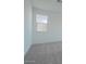 Bright bedroom features neutral carpeting and a window at 40113 N Alameda Dr, San Tan Valley, AZ 85140