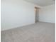 Bright bedroom features neutral carpeting at 40113 N Alameda Dr, San Tan Valley, AZ 85140