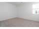Bright bedroom with neutral carpet and window with blinds at 40113 N Alameda Dr, San Tan Valley, AZ 85140