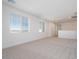 Expansive bonus room with ample natural light from large windows, perfect for Gathering activities at 40113 N Alameda Dr, San Tan Valley, AZ 85140