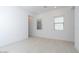 Bedroom features neutral walls, tile flooring and multiple windows that offer natural light at 40129 N Alameda Dr, San Tan Valley, AZ 85140
