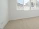 Bedroom features neutral walls, carpet flooring and multiple windows that offer natural light at 40129 N Alameda Dr, San Tan Valley, AZ 85140