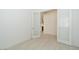 Bright bedroom features neutral walls, tile flooring and a glass paneled door that offers natural light at 40129 N Alameda Dr, San Tan Valley, AZ 85140