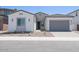 Charming single-story home with a well-maintained yard and a neutral color scheme at 40129 N Alameda Dr, San Tan Valley, AZ 85140
