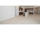 Open-concept layout featuring a kitchen with an island, modern appliances, and a seamless transition to the living area at 40129 N Alameda Dr, San Tan Valley, AZ 85140