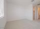 Bright bedroom featuring neutral carpet, white walls, and natural light from a window with blinds at 40147 N Alameda Dr, San Tan Valley, AZ 85140