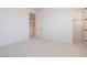 Cozy bedroom with neutral carpeting, offering a clean and inviting space with ample natural light and closet space at 40147 N Alameda Dr, San Tan Valley, AZ 85140