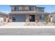 Two-story home featuring a neutral color palette, large garage, and low maintenance desert landscaping at 40147 N Alameda Dr, San Tan Valley, AZ 85140