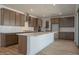Spacious kitchen with stainless steel appliances, a large island, and modern cabinetry at 40147 N Alameda Dr, San Tan Valley, AZ 85140