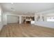 Large living room with new wood-look flooring and ample natural light at 40147 N Alameda Dr, San Tan Valley, AZ 85140