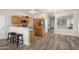 Open kitchen featuring wooden cabinetry, granite countertops, and stainless steel appliances at 4261 E Baylor Ln, Gilbert, AZ 85296