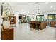 Bright, modern kitchen features large island with seating and open floor plan to dining area and stainless steel appliances at 4625 E Mountain View Rd, Phoenix, AZ 85028