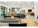 View of the kitchen from the dining table, showing the island and stainless steel appliances at 4625 E Mountain View Rd, Phoenix, AZ 85028