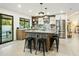 Modern kitchen with wood cabinets, stainless steel appliances, granite countertops, access to the pool at 4625 E Mountain View Rd, Phoenix, AZ 85028