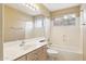 Well-lit bathroom featuring a tub and a single sink vanity at 4693 W Tara Dr, Chandler, AZ 85226