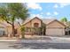 Inviting single-Gathering home featuring a well-maintained front yard, desert landscaping, and a two-car garage at 4693 W Tara Dr, Chandler, AZ 85226