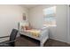 Cozy bedroom with neutral walls, plush carpet, and a charming, decorative theme at 5101 E Sharbel Rd, San Tan Valley, AZ 85143