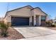 Welcoming single-Gathering home with low-maintenance landscaping and an attached two-car garage at 5101 E Sharbel Rd, San Tan Valley, AZ 85143