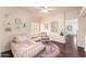 Inviting bedroom with a daybed by the window, a comfortable chair, and a cozy atmosphere at 5426 E Fountain Cir, Mesa, AZ 85205