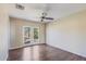 Bedroom with a ceiling fan and french doors leading to the backyard at 7430 E Coronado Rd, Scottsdale, AZ 85257