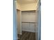 This closet is designed with rods for ample storage and nice floors at 7575 E Indian Bend Rd # 1089, Scottsdale, AZ 85250