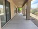 Covered back patio with concrete flooring, columns, and a view of the backyard at 9142 E La Posada Ct, Scottsdale, AZ 85255