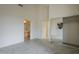 Bedroom with tile flooring, an ensuite bathroom, and a mirrored closet at 9142 E La Posada Ct, Scottsdale, AZ 85255