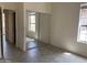 The bedroom includes mirrored closet doors, neutral walls, and tiled floors, creating a serene space at 9142 E La Posada Ct, Scottsdale, AZ 85255