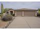 Charming home with a tile roof and spacious three-car garage at 9142 E La Posada Ct, Scottsdale, AZ 85255