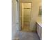 The hallway leads to a bathroom with a shower and bathtub at 9142 E La Posada Ct, Scottsdale, AZ 85255