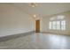 Bright living room featuring tile floors, large windows, and natural light at 9142 E La Posada Ct, Scottsdale, AZ 85255
