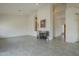 The spacious living room features tile flooring and a fireplace at 9142 E La Posada Ct, Scottsdale, AZ 85255