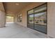 Covered patio showcasing direct backyard views through glass sliding doors and windows at 9142 E La Posada Ct, Scottsdale, AZ 85255
