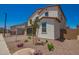 Attractive two-story home with desert landscaping at 11623 W Green Dr, Youngtown, AZ 85363