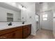 Bathroom with double sink, shower, and modern fixtures at 11627 W Green Dr, Youngtown, AZ 85363